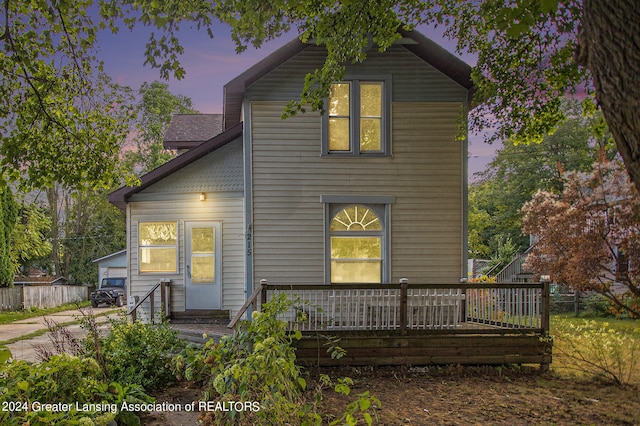 view of front property with a wooden deck