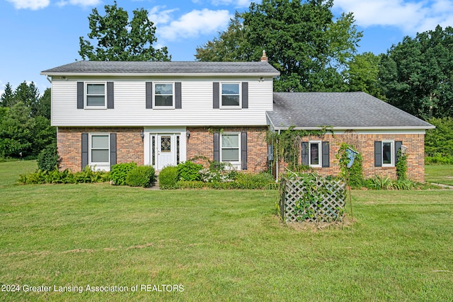 view of front of home with a front yard