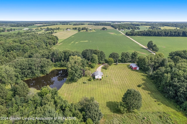 aerial view with a water view and a rural view