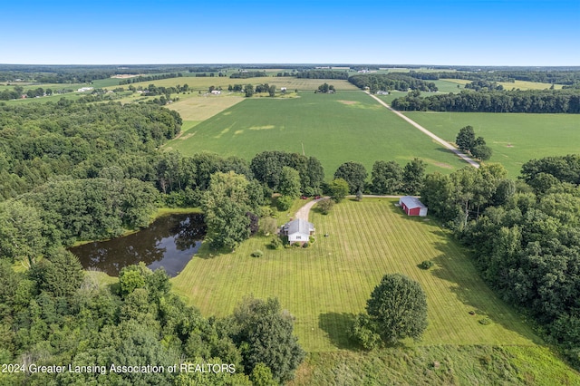 drone / aerial view with a water view and a rural view