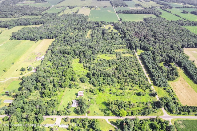 birds eye view of property featuring a rural view