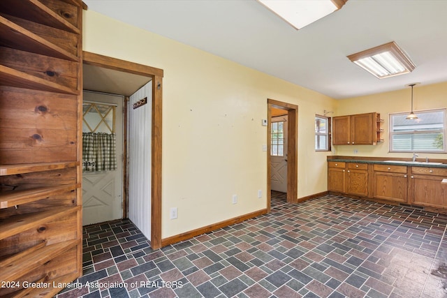 kitchen with sink and decorative light fixtures