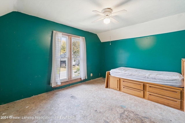 bedroom featuring lofted ceiling and ceiling fan