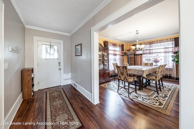 entryway with ornamental molding, plenty of natural light, and dark wood-type flooring