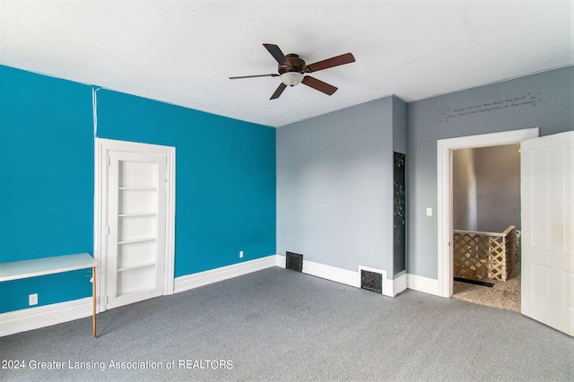 unfurnished bedroom with carpet floors and ceiling fan