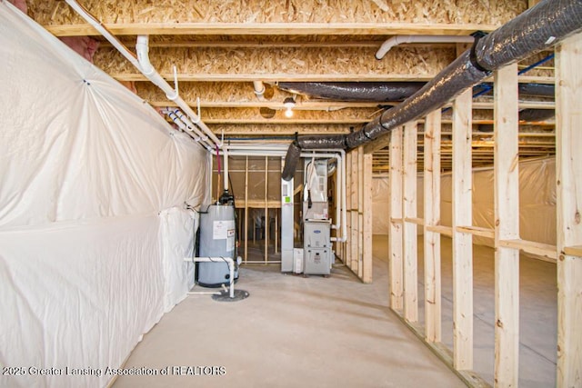 basement with heating unit and water heater