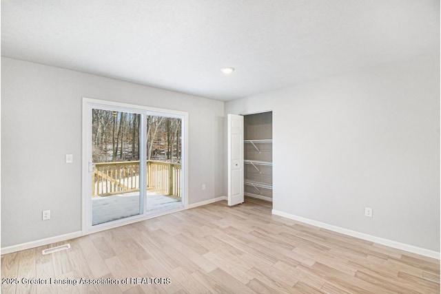 empty room featuring light hardwood / wood-style floors