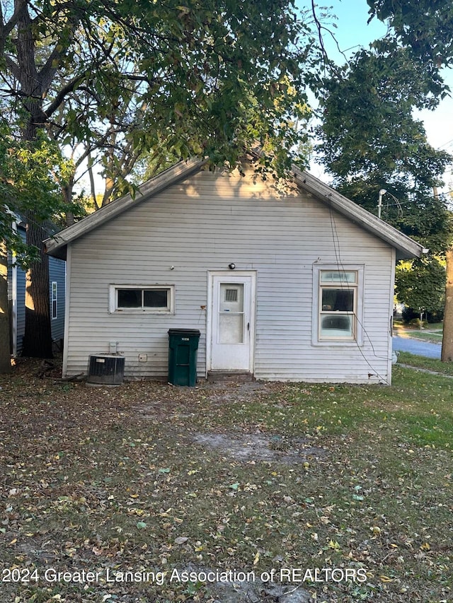 back of property with cooling unit