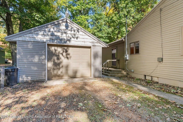 garage with wood walls