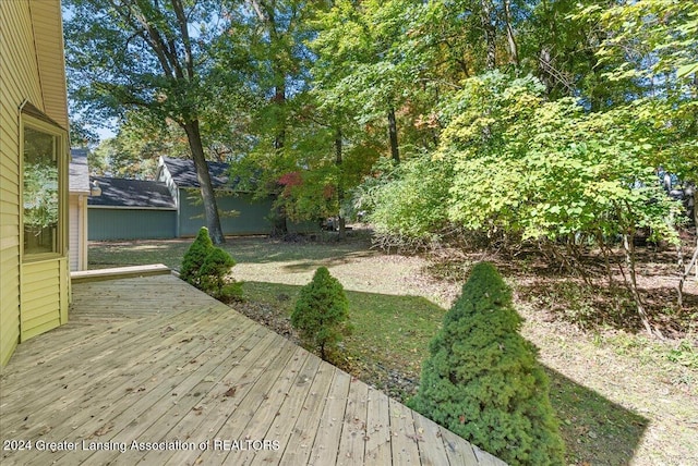 view of yard with a wooden deck