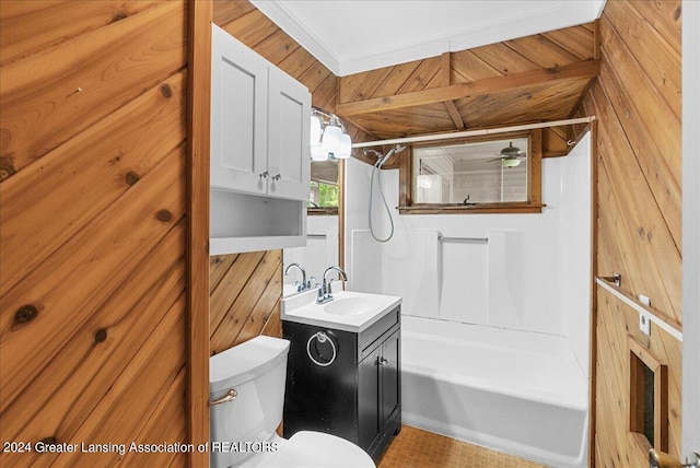 full bathroom featuring shower / tub combination, toilet, vanity, crown molding, and wooden walls