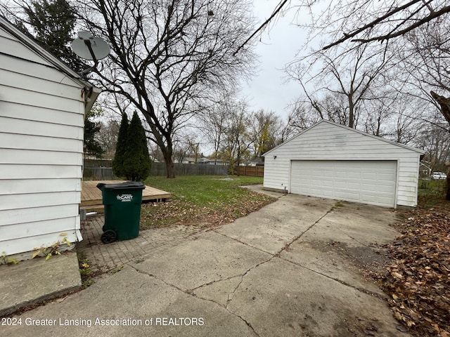 garage featuring a lawn