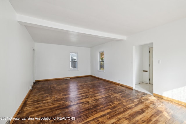 empty room with wood-type flooring