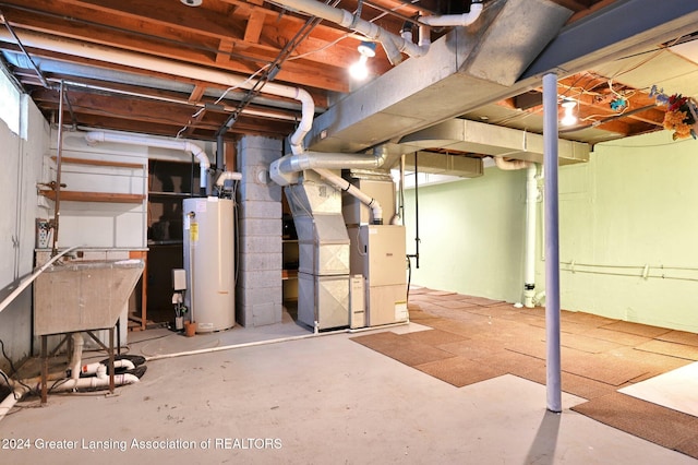 basement featuring heating unit and gas water heater