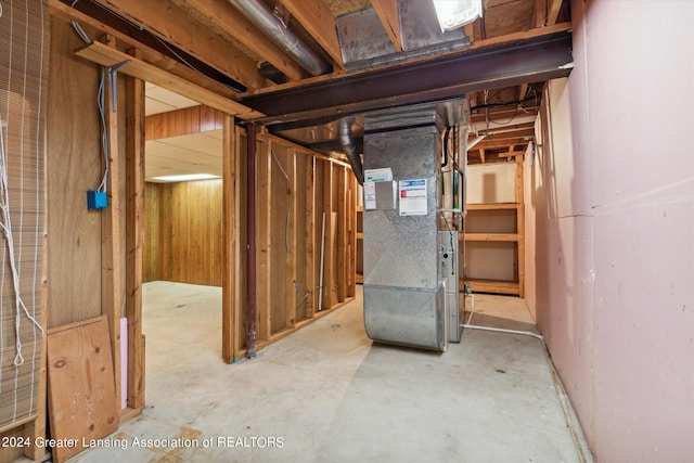 basement featuring heating unit