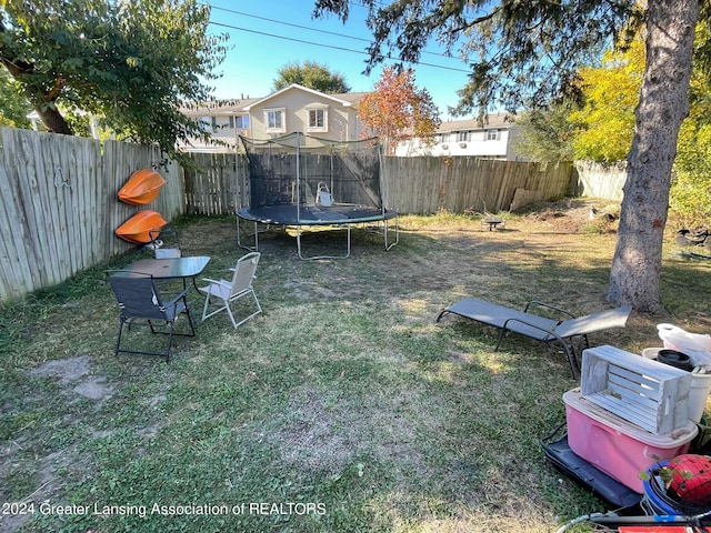 view of yard featuring a trampoline