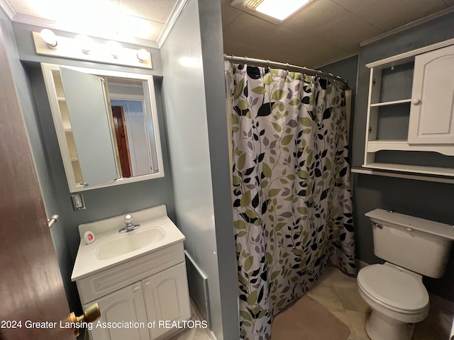 bathroom featuring a shower with curtain, vanity, crown molding, and toilet