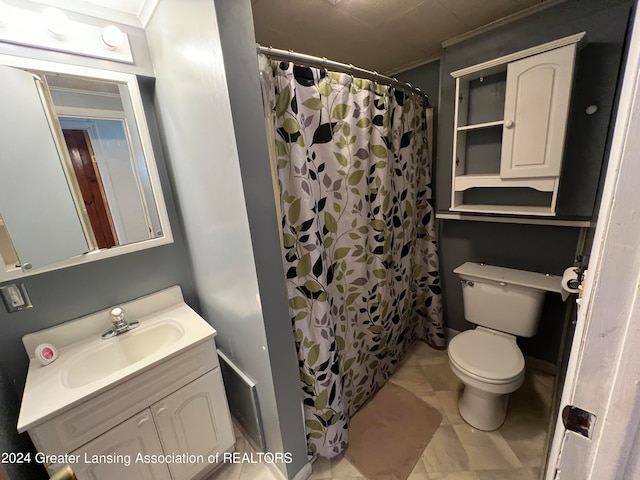 bathroom featuring vanity, crown molding, toilet, and a shower with shower curtain