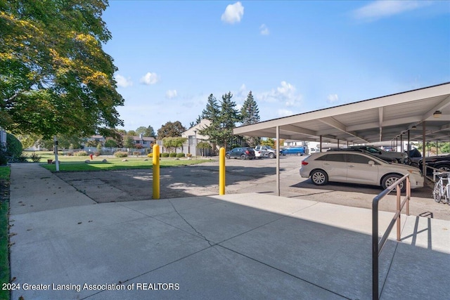 view of car parking featuring a carport