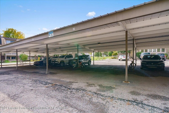 view of car parking featuring a carport