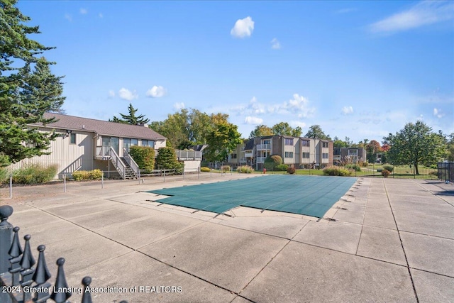 view of pool with a patio