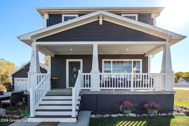 view of front of property featuring covered porch