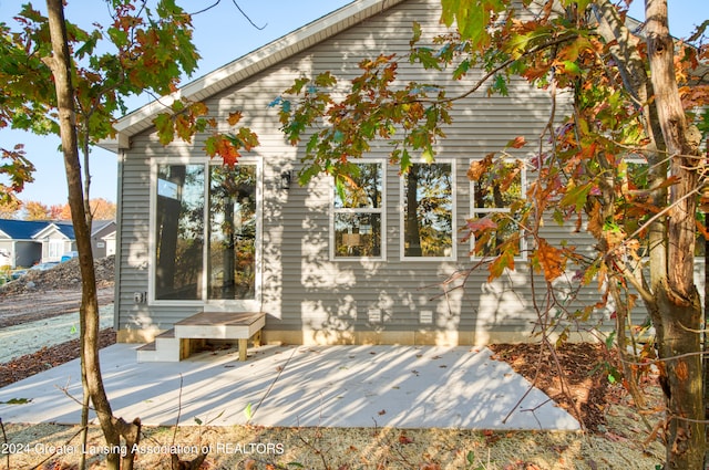 rear view of house with a patio