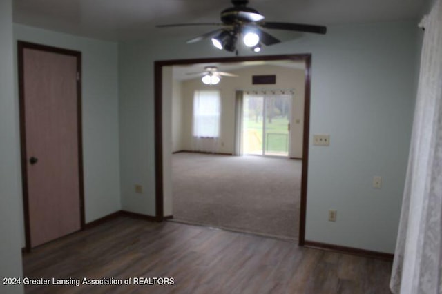 unfurnished room with ceiling fan and hardwood / wood-style floors