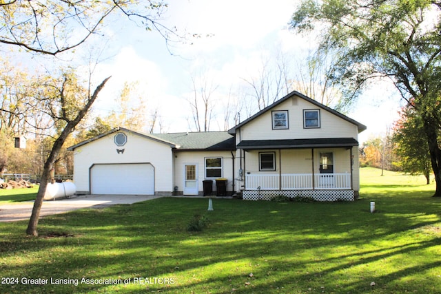 view of front of home featuring a garage, a porch, and a front lawn