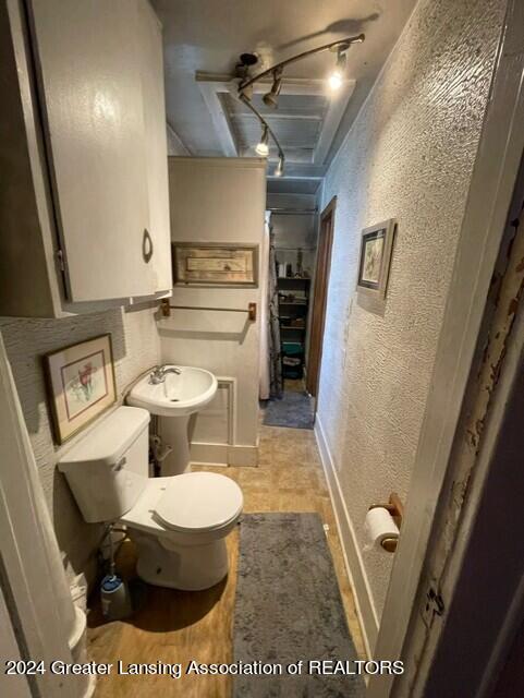 bathroom with sink and toilet