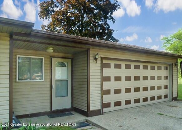 property entrance with a garage