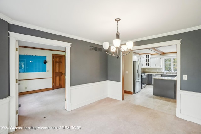 unfurnished dining area featuring ornamental molding, a notable chandelier, and light colored carpet