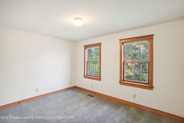 unfurnished room featuring carpet floors