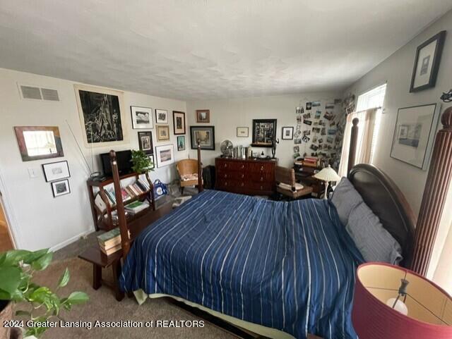 bedroom featuring carpet