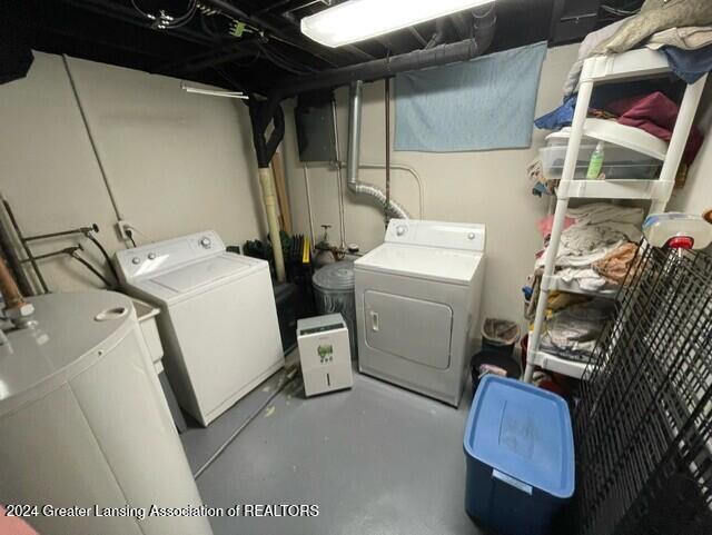 laundry area featuring washing machine and clothes dryer