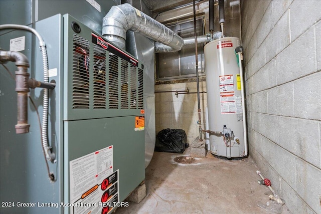 utility room featuring heating unit and water heater