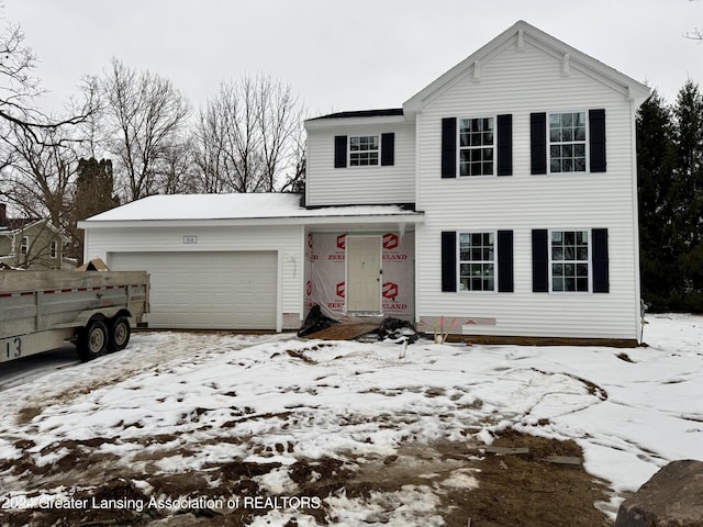 view of front of property featuring a garage