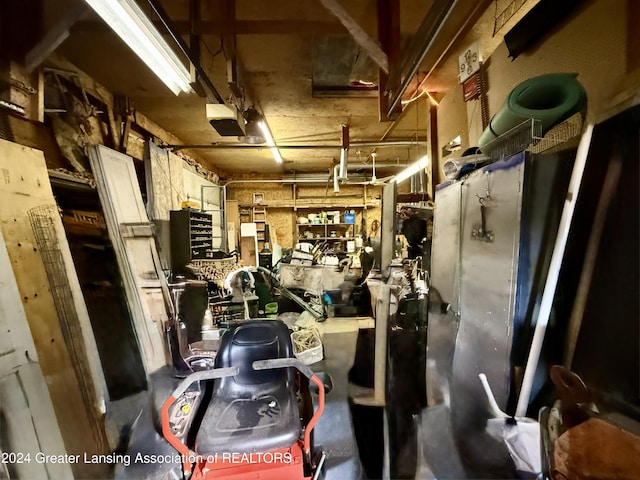 interior space with a garage door opener and a workshop area