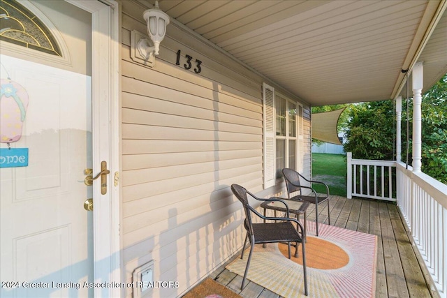 deck featuring covered porch