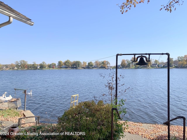 view of dock with a water view