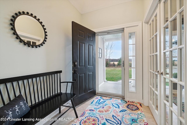 entryway featuring light tile patterned floors