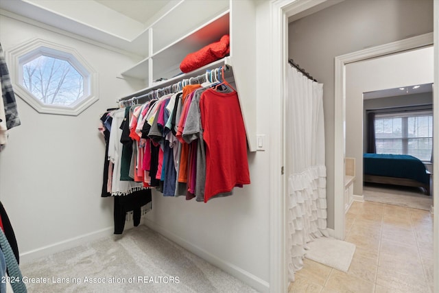 spacious closet with tile patterned flooring