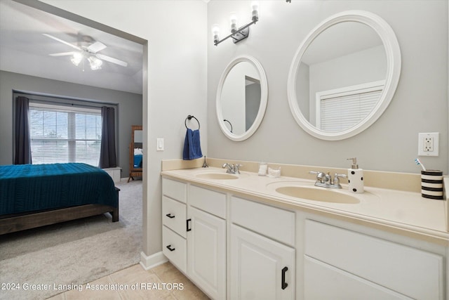 bathroom with vanity, ceiling fan, and tile patterned flooring