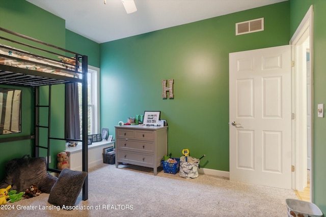 carpeted bedroom featuring ceiling fan