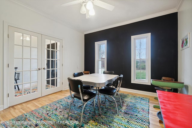 dining area with french doors, ceiling fan, ornamental molding, and hardwood / wood-style floors