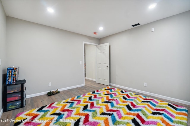 recreation room featuring hardwood / wood-style floors