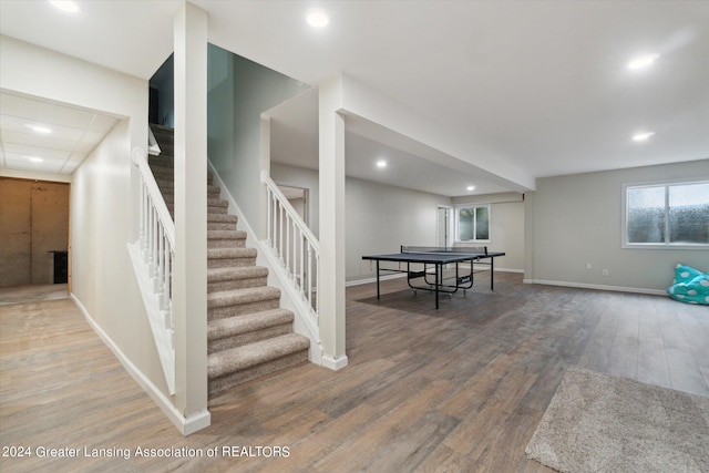 rec room with wood-type flooring and a healthy amount of sunlight