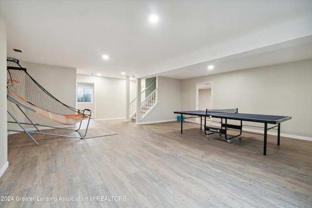 playroom featuring hardwood / wood-style floors