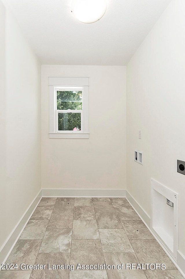 laundry area with washer hookup and hookup for an electric dryer