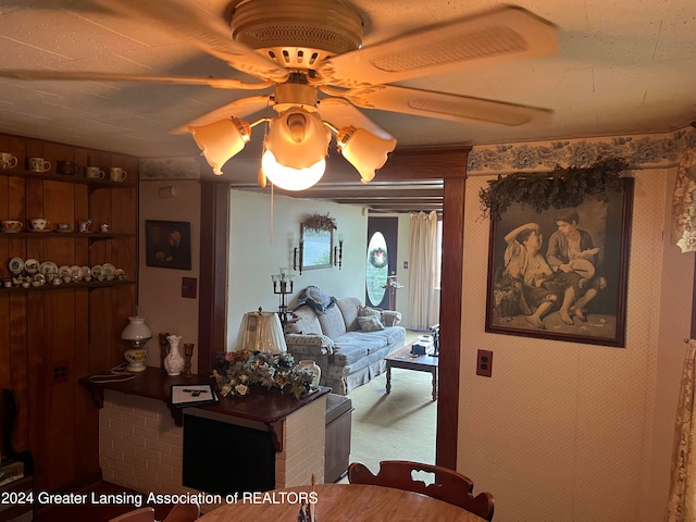 living room with ceiling fan